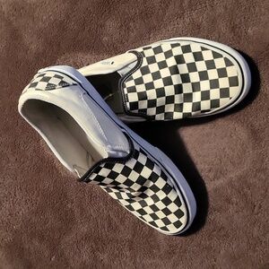 Classic black n white checkered slip on Vans. Size womens 9.5